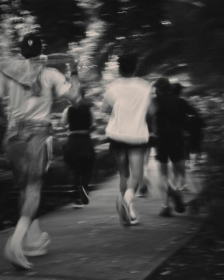 A group sharing a run outdoors