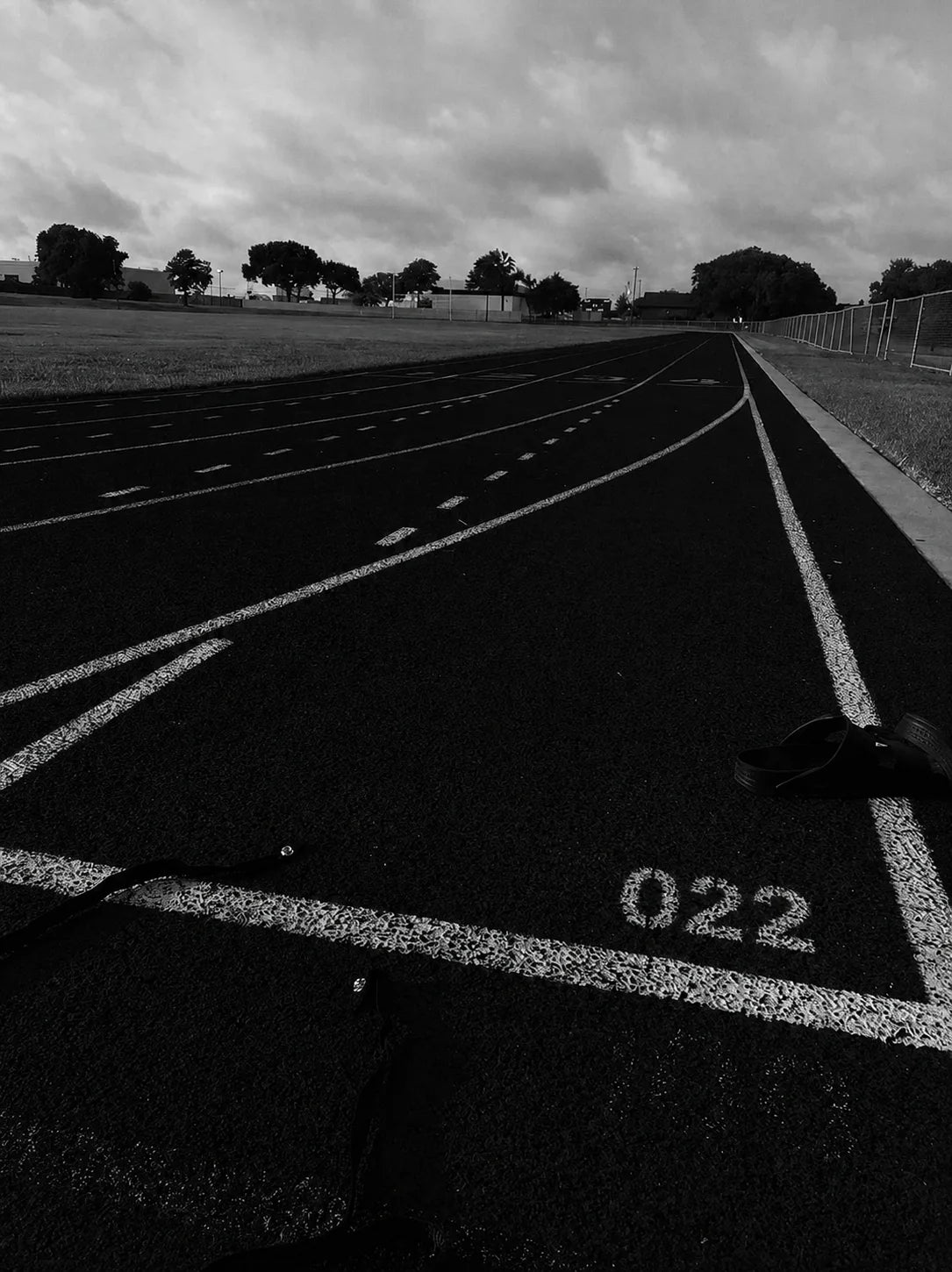 022 marked on the starting line of a running track